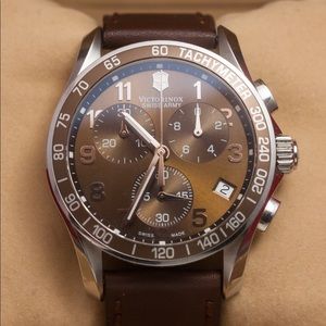 Brown leather Victorniox Watch. Brand new!!